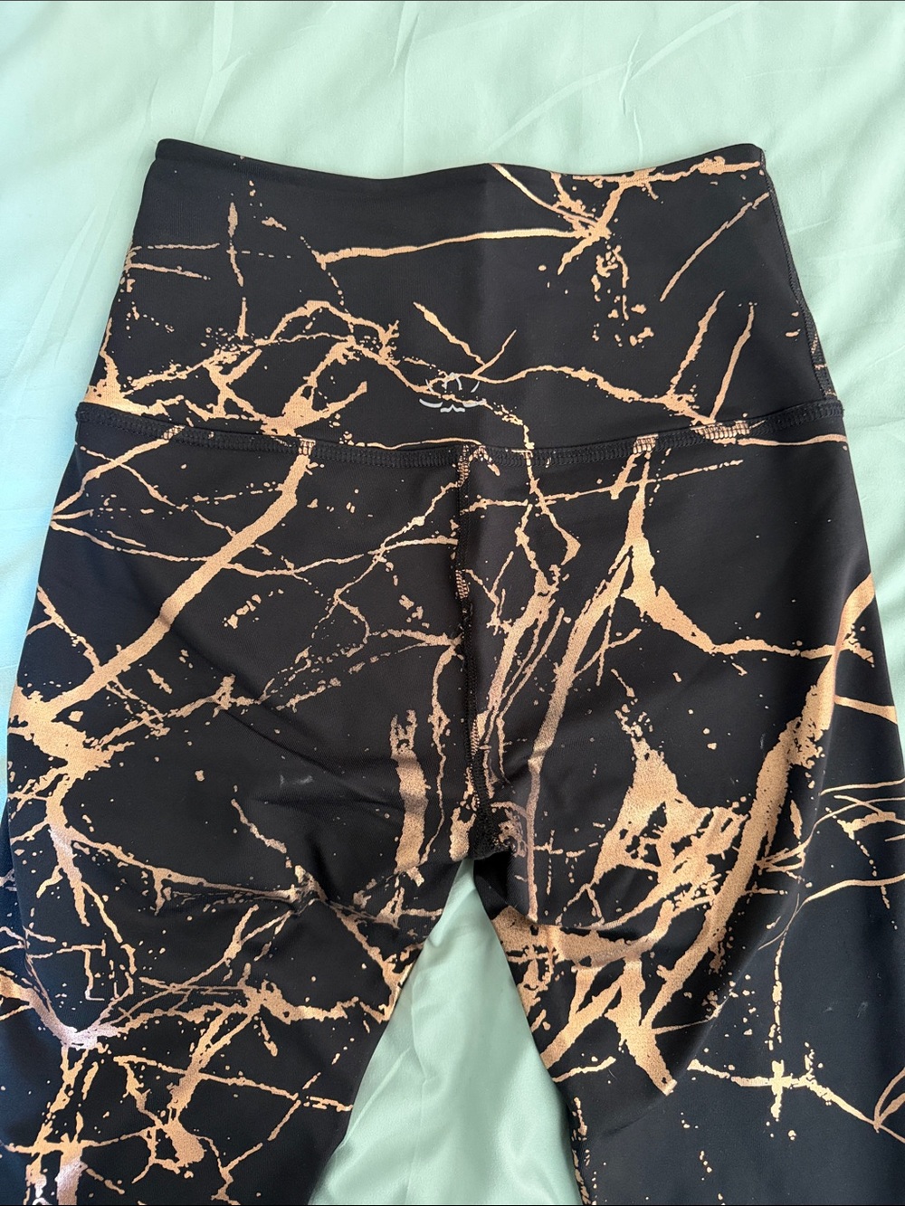Beyond Yoga Black Leggings with Metallic Gold Splash small Y12